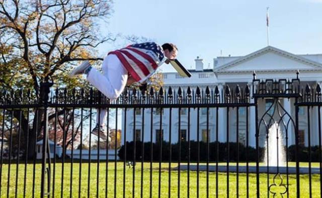 man-jumping-into-white-house-niharonline